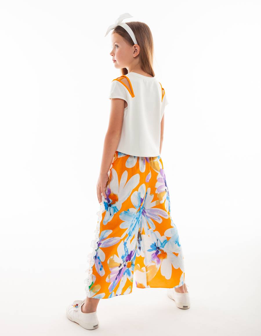 PT08210_BLUE_AND_ORANGE_FLORAL_PATTERNED_WHITE_FRILL_DETAILS_ON_THE_SIDES_WIDE_LEG_-GIRLS_TROUSERS_2-min